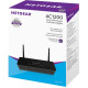 NETGEAR R6220 AC1200 Mbps dual band gigabit router for seamless internet connectivity in homes and offices.